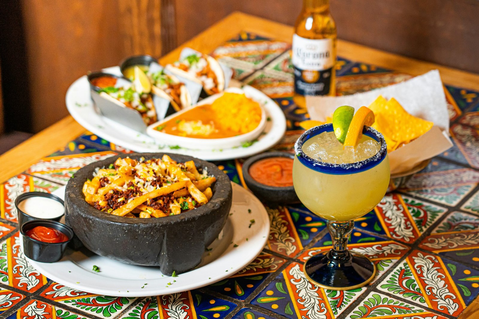 Mexican restaurant dishes and drinks arranged on a table